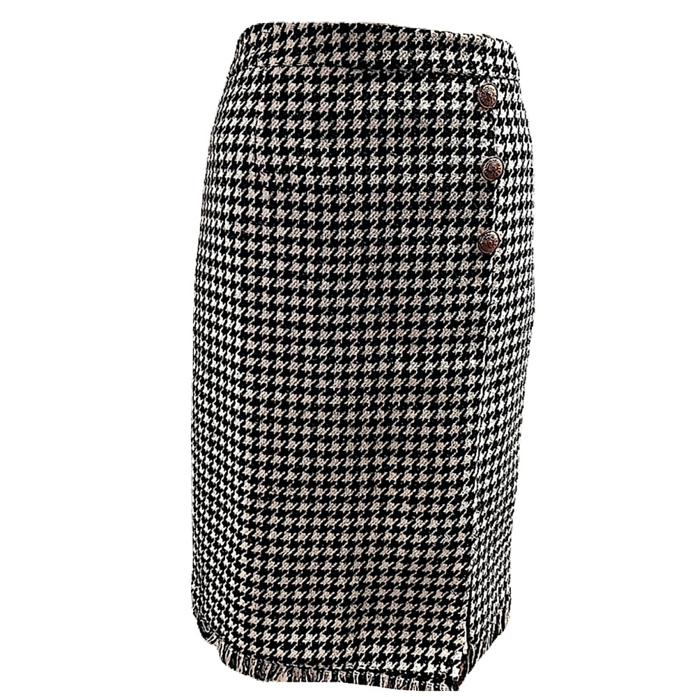 Wool MIidi skirt in an allover houndstooth print 
High rise